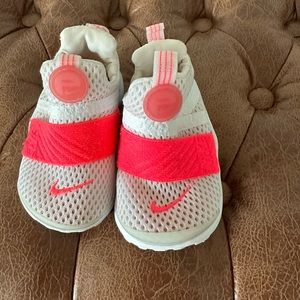 Hot pink and white toddler Nikes